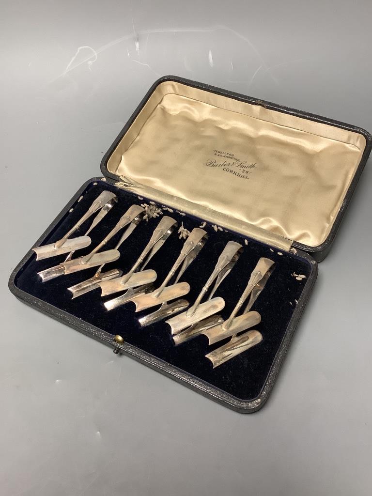 A cased set of six Edwardian silver asparagus tongs, George Howson, Sheffield, 1903